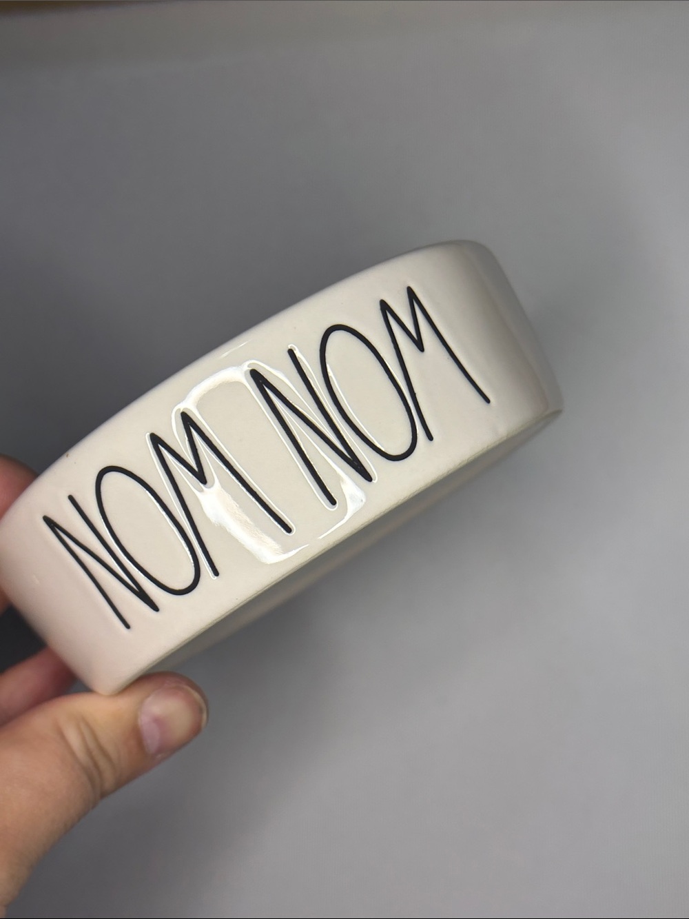 NWOT Rae Dunn “nom nom” pet dish